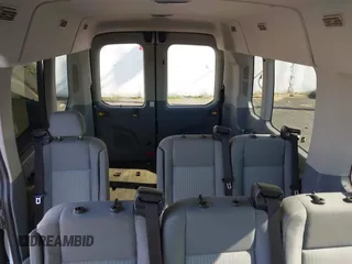 2015 Ford Transit Passenger XL z VIN 1FBAX2CG7FKA75719, wystawiony jako IAAI lot #42135118 z przebiegiem Nie podano mil oraz . Historia ofert i sprzedaży dostępna na DreamBid. Obrazek 19.