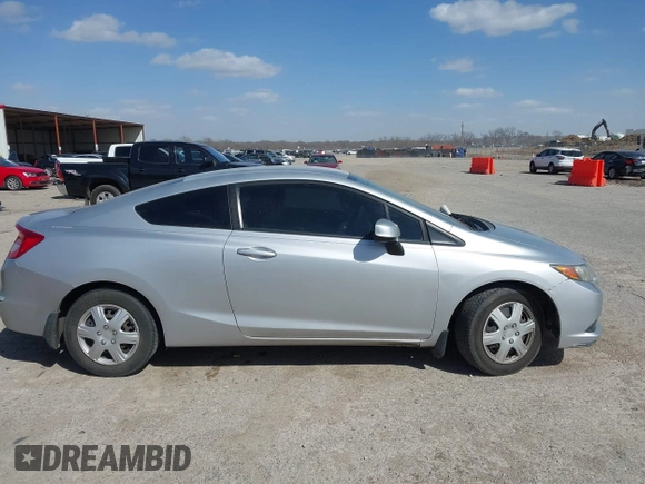 2012 Honda Civic Cpe LX with VIN 2HGFG3B52CH549698, listed as a IAAI auction lot 41818647 with 100,975 mi miles. Bid and sale history available at carsss.com. Image 13.