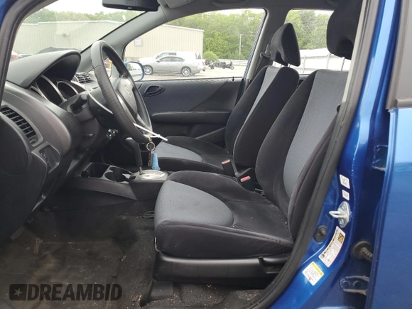 2007 Honda Fit with VIN JHMGD38497S020207, listed as a Copart auction lot 57447875 with 185,603 mi miles and Salvage title. Bid and sale history available at DreamBid. Image 7.