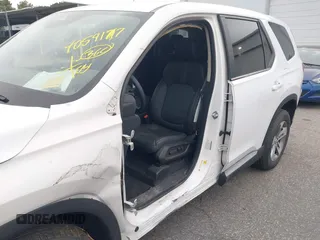 2023 Honda Pilot EX-L with VIN 5FNYG1H58PB016138, listed as a IAAI auction lot 40591717 with 10,068 mi miles and . Bid and sale history available at DreamBid. Image 6.