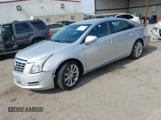 2014 Cadillac XTS Luxury with VIN 2G61N5S30E9294994, listed as a IAAI auction lot 42617654 with 159,573 mi miles and . Bid and sale history available at DreamBid. Image 2.