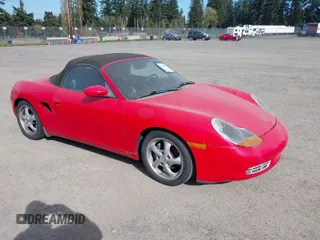 2000 Porsche Boxster z VIN WP0CA298XYU626402, wystawiony jako IAAI lot #42047879 z przebiegiem 82 966 mil mil oraz . Historia ofert i sprzedaży dostępna na DreamBid. Obrazek 1.