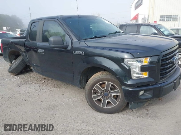 2015 Ford F-150 XL with VIN 1FTEX1CF2FKD12874, listed as a IAAI auction lot 41860610 with 242,215 mi miles. Bid and sale history available at carsss.com. Image 1.