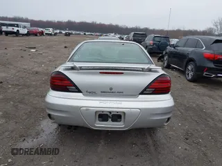 2003 Pontiac Grand Am SE with VIN 1G2NE52F03C323218, listed as a IAAI auction lot 41899309 with 90,195 mi miles. Bid and sale history available at carsss.com. Image 16.