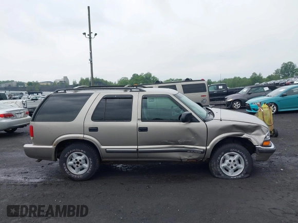 2000 Chevrolet Blazer LT with VIN 1GNDT13W9YK287456, listed as a IAAI auction lot 42450504 with 139,649 mi miles and . Bid and sale history available at DreamBid. Image 13.