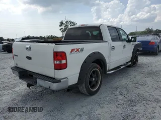 2005 Ford F-150 XLT z VIN 1FTPW12515KD45612, wystawiony jako Copart lot #60779845 z przebiegiem 196 331 mil mil oraz Szkoda całkowita • Salvage title. Historia ofert i sprzedaży dostępna na DreamBid. Obrazek 3.