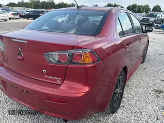 2016 Mitsubishi Lancer SE with VIN JA32V2FW5GU013006, listed as a Copart auction lot 55860815 with 122,815 mi miles and Clean Title. Bid and sale history available at carsss.com. Image 4.