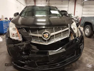 2011 Cadillac SRX Luxury Collection with VIN 3GYFNDEY3BS675672, listed as a IAAI auction lot 41804978 with 148,136 mi miles. Bid and sale history available at carsss.com. Image 12.