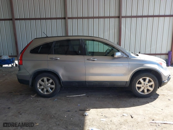 2007 Honda CR-V EX-L with VIN JHLRE387X7C069804, listed as a IAAI auction lot 41616256 with 136,271 mi miles. Bid and sale history available at carsss.com. Image 14.
