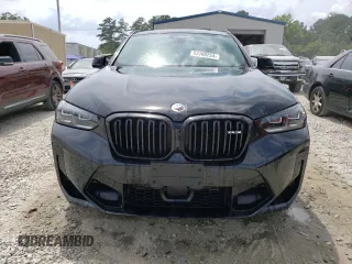 2022 BMW X4 M z VIN 5YM23EC02N9M62773, wystawiony jako Copart lot #53100254 z przebiegiem 9566 mil mil oraz Szkody całkowita. Historia ofert i sprzedaży dostępna na DreamBid. Obrazek 5.