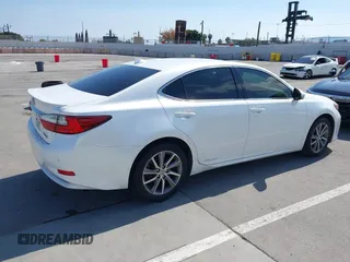 2016 Lexus ES 300h with VIN JTHBW1GG7G2109813, listed as a IAAI auction lot 42119720 with 146,698 mi miles and . Bid and sale history available at DreamBid. Image 4.