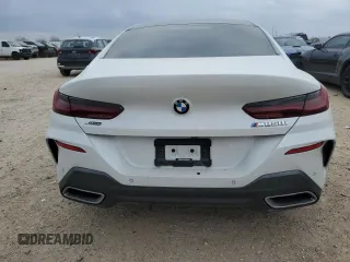 2023 BMW 8 Series M850i z VIN WBAGV8C01PCK29190, wystawiony jako Copart lot #47189205 z przebiegiem 32 691 mil mil oraz Szkoda całkowita • Salvage title. Historia ofert i sprzedaży dostępna na DreamBid. Obrazek 6.