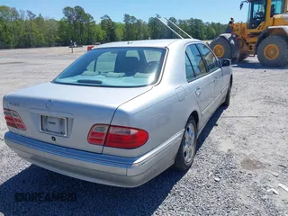 2002 Mercedes-Benz E-Class with VIN WDBJF65J72B441380, listed as a IAAI auction lot 42040268 with 210,471 mi miles. Bid and sale history available at carsss.com. Image 4.