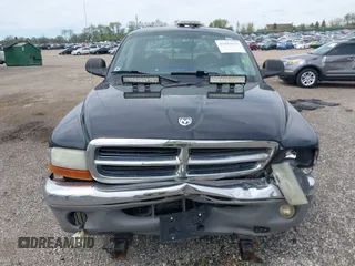 2004 Dodge Dakota SLT z VIN 1D7HG48N54S664848, wystawiony jako IAAI lot #42152635 z przebiegiem 153 824 mil mil oraz . Historia ofert i sprzedaży dostępna na DreamBid. Obrazek 12.