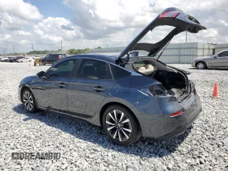 2023 Honda Civic EX-L z VIN 19XFL1H72PE010913, wystawiony jako Copart lot #51608005 z przebiegiem 35 961 mil mil oraz Szkoda całkowita • Salvage title. Historia ofert i sprzedaży dostępna na DreamBid. Obrazek 2.