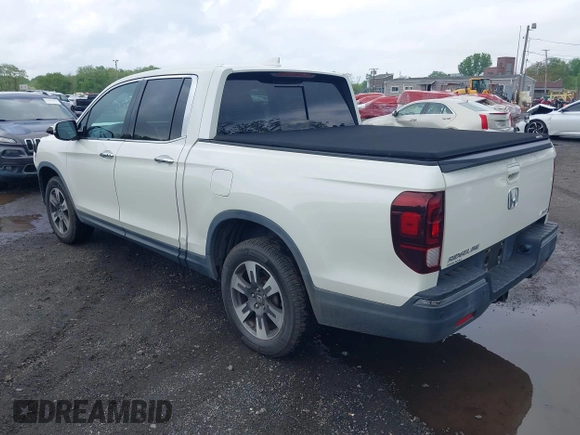 2019 Honda Ridgeline RTL-E with VIN 5FPYK3F75KB020713, listed as a IAAI auction lot 42191152 with 31,245 mi miles and . Bid and sale history available at DreamBid. Image 3.