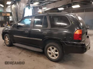 2007 GMC Envoy SLE with VIN 1GKDT13S872298442, listed as a IAAI auction lot 41343565 with 106,818 mi miles. Bid and sale history available at carsss.com. Image 3.