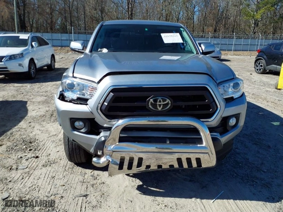 2023 Toyota Tacoma 4WD SR with VIN 3TMCZ5ANXPM609159, listed as a IAAI auction lot 41650165 with 14,987 mi miles. Bid and sale history available at carsss.com. Image 12.