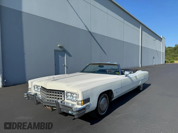1973 Cadillac Eldorado z VIN 6L67S3Q410957, wystawiony jako Copart lot #64316435 z przebiegiem 74 584 mil mil oraz Czysty tytuł • Clean title. Historia ofert i sprzedaży dostępna na DreamBid. Obrazek 2.