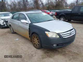 2007 Toyota Avalon XL with VIN 4T1BK36B57U174223, listed as a IAAI auction lot 41910541 with 220,304 mi miles. Bid and sale history available at carsss.com. Image 1.