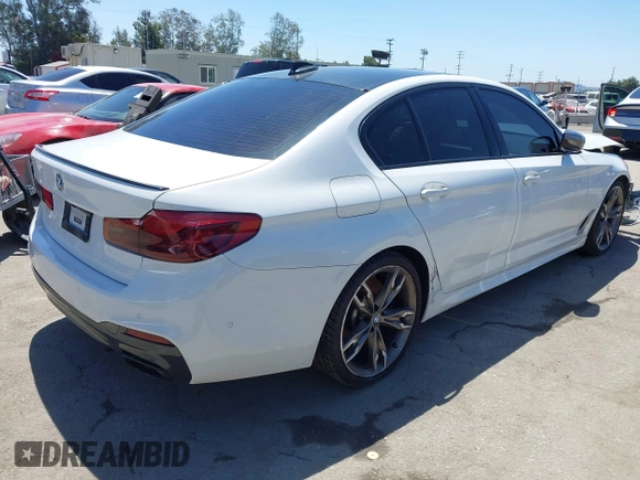 2020 BMW 5 Series M550i xDrive with VIN WBAJS7C0XLCD42738, listed as a IAAI auction lot 42326945 with 50,046 mi miles and . Bid and sale history available at DreamBid. Image 4.