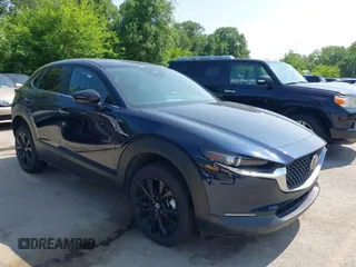 2024 Mazda CX-30 S Select Sport z VIN 3MVDMBBMXRM637259, wystawiony jako IAAI lot #42385393 z przebiegiem 28 683 mil mil oraz . Historia ofert i sprzedaży dostępna na DreamBid. Obrazek 1.