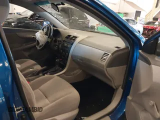 2009 Toyota Corolla with VIN 1NXBU40E19Z027256, listed as a IAAI auction lot 41383298 with 221,545 mi miles. Bid and sale history available at carsss.com. Image 5.