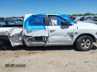 2021 Ram 1500 SLT with VIN 1C6RR6TTXMS517345, listed as a IAAI auction lot 42314123 with 107,307 mi miles and . Bid and sale history available at DreamBid. Image 13.