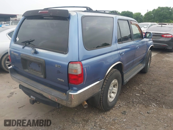 1999 Toyota 4Runner SR5 with VIN JT3GN86R1X0097244, listed as a IAAI auction lot 41948315 with 128,531 mi miles and . Bid and sale history available at DreamBid. Image 4.