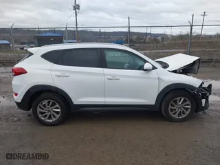 2016 Hyundai Tucson SE with VIN KM8J3CA40GU145648, listed as a IAAI auction lot 41951378 with 115,486 mi miles. Bid and sale history available at carsss.com. Image 14.