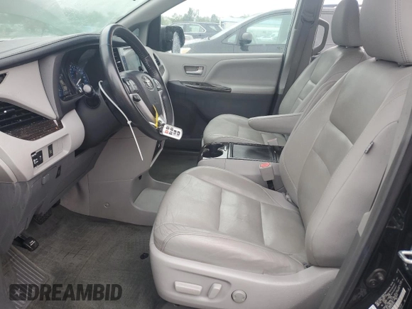 2015 Toyota Sienna XLE с VIN 5TDYK3DC6FS531521, выставлен на аукционе Copart как лот 62923695 с пробегом 135 782 миль миль и Списание • Salvage title. История ставок и продаж доступна на DreamBid. Изображение 7.