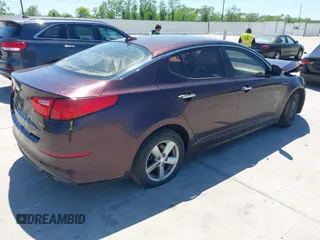 2014 Kia Optima LX with VIN 5XXGM4A77EG274839, listed as a IAAI auction lot 41976091 with 130,517 mi miles. Bid and sale history available at carsss.com. Image 4.