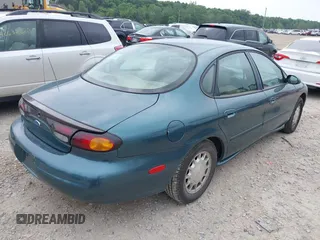 1996 Ford Taurus LX with VIN 1FALP53S3TG177324, listed as a IAAI auction lot 42622520 with 126,979 mi miles and . Bid and sale history available at DreamBid. Image 4.