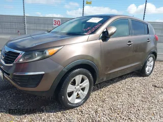 2013 Kia Sportage LX with VIN KNDPB3A24D7416706, listed as a IAAI auction lot 42525729 with 166,798 mi miles and . Bid and sale history available at DreamBid. Image 2.