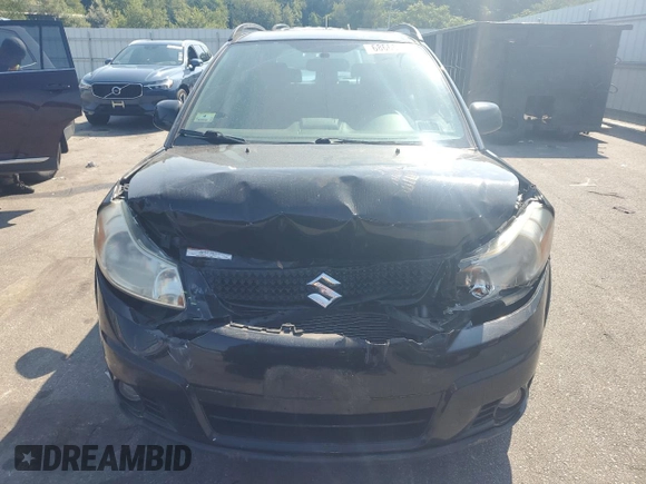 2012 Suzuki SX4 Crossover with VIN JS2YB5A32C6301976, listed as a Copart auction lot 68665194 with 104,489 mi miles and Clean Title. Bid and sale history available at carsss.com. Image 5.