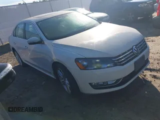 2014 Volkswagen Passat SEL Premium with VIN 1VWCN7A39EC053668, listed as a IAAI auction lot 42843112 with 126,933 mi miles and . Bid and sale history available at DreamBid. Image 1.