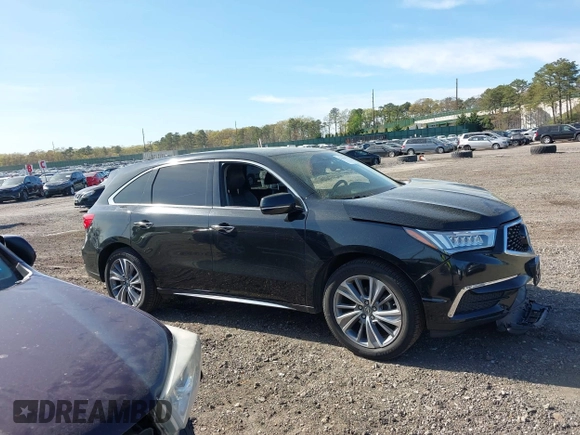 2018 Acura MDX Technology z VIN 5J8YD4H59JL008095, wystawiony jako IAAI lot #42144307 z przebiegiem 81 362 mil mil oraz . Historia ofert i sprzedaży dostępna na DreamBid. Obrazek 13.