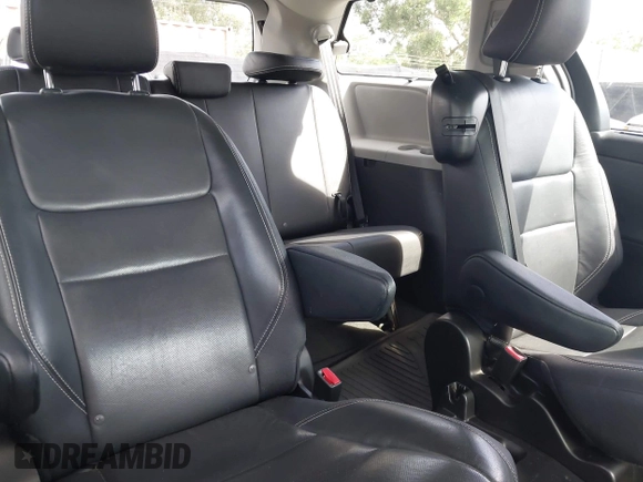 2016 Toyota Sienna SE with VIN 5TDXK3DC9GS719995, listed as a IAAI auction lot 42421273 with 126,943 mi miles and . Bid and sale history available at DreamBid. Image 8.
