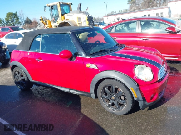 2009 MINI Convertible with VIN WMWMR33569TU95961, listed as a IAAI auction lot 41689845 with 107,934 mi miles and . Bid and sale history available at DreamBid. Image 13.