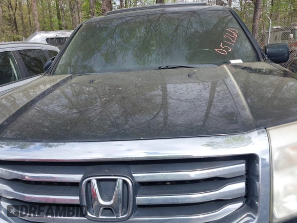 2012 Honda Pilot Touring with VIN 5FNYF4H92CB051260, listed as a IAAI auction lot 41906802 with 256,691 mi miles. Bid and sale history available at carsss.com. Image 10.