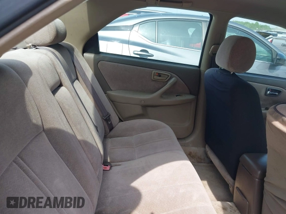 1997 Toyota Camry LE z VIN 4T1BG22K2VU778245, wystawiony jako IAAI lot #42145592 z przebiegiem 276 611 mil mil oraz . Historia ofert i sprzedaży dostępna na DreamBid. Obrazek 8.