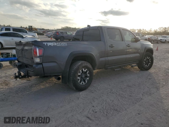 2021 Toyota Tacoma 4WD SR5 with VIN 5TFDZ5BN8MX062787, listed as a Copart auction lot 82918264 with 59,351 mi miles and Salvage Title. Bid and sale history available at carsss.com. Image 3.