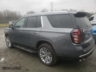2021 Chevrolet Tahoe Premier with VIN 1GNSKSKDXMR122730, listed as a Copart auction lot 84590204 with 30,560 mi miles and Salvage Title. Bid and sale history available at carsss.com. Image 2.