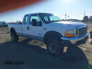1999 Ford Super Duty F-250 XL with VIN 1FTNX21F4XED35890, listed as a IAAI auction lot 41420623 with 214,432 mi miles. Bid and sale history available at carsss.com. Image 1.