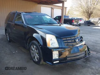 2008 Cadillac SRX AWD with VIN 1GYEE437080212779, listed as a IAAI auction lot 41703254 with 182,914 mi miles. Bid and sale history available at carsss.com. Image 1.