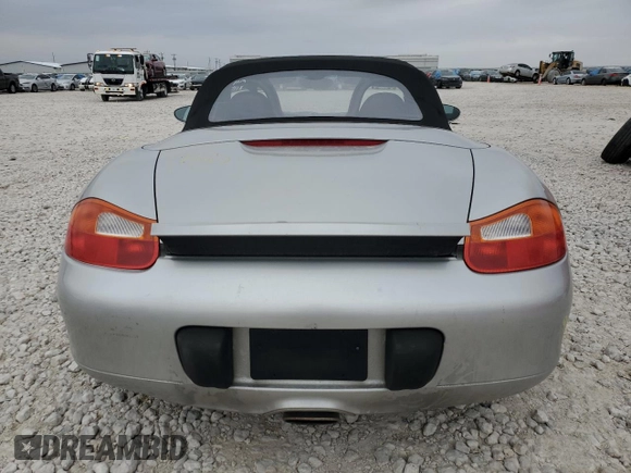 2001 Porsche Boxster с VIN WP0CA29821U621779, выставлен на аукционе Copart как лот 87204984 с пробегом 82 091 миль миль и Списание • Salvage title. История ставок и продаж доступна на DreamBid. Изображение 6.