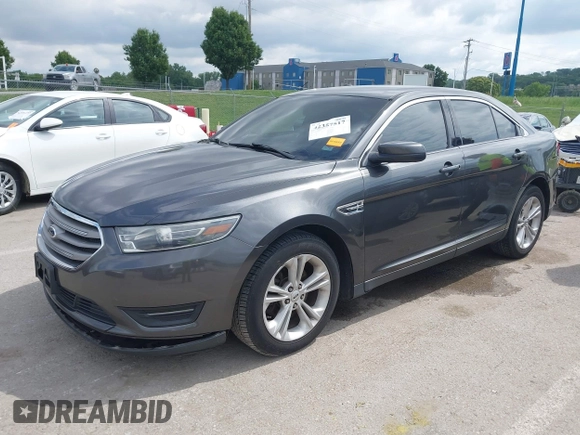 2015 Ford Taurus SEL with VIN 1FAHP2E83FG175051, listed as a IAAI auction lot 42357517 with 200,033 mi miles and . Bid and sale history available at DreamBid. Image 2.