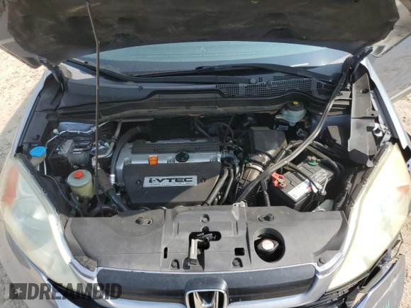2008 Honda CR-V LX with VIN 3CZRE38318G705321, listed as a Copart auction lot 58996545 with 173,373 mi miles and Salvage title. Bid and sale history available at DreamBid. Image 11.
