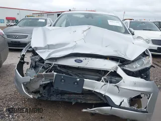 2019 Ford Fusion S with VIN 3FA6P0G71KR275393, listed as a IAAI auction lot 41827288 with 108,160 mi miles and . Bid and sale history available at DreamBid. Image 6.