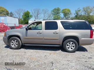 2007 GMC Yukon XL SLT z VIN 1GKFC16087J200390, wystawiony jako IAAI lot #42049673 z przebiegiem 169 174 mil mil oraz . Historia ofert i sprzedaży dostępna na DreamBid. Obrazek 14.